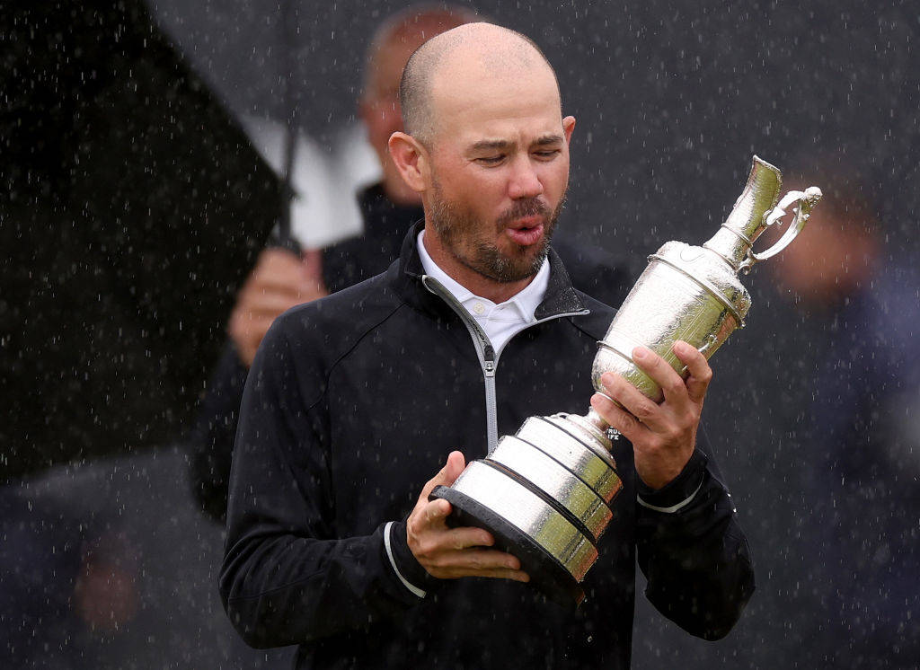 Brian Harman holds his Claret Jug at Royal Liverpool